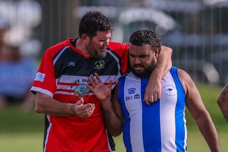 Phillip Hughes (Dingo Cubs Rugby) and Robert Smith (South Alice Springs Football) during last week's Dingo Cub Social 10s. Picture: Charlie Lowson Photography (via Dingo Cubs Facebook)